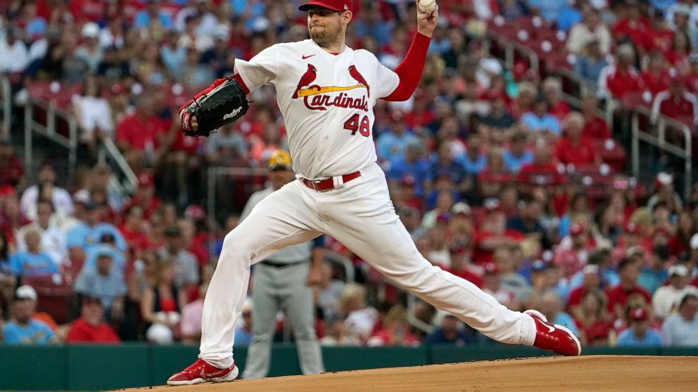 St. Louis Cardinals starting pitcher Jordan Montgomery throws during the first inning of a baseball game against the Milwaukee Brewers Friday, Aug. 12, 2022, in St. Louis. (AP Photo/Jeff Roberson)