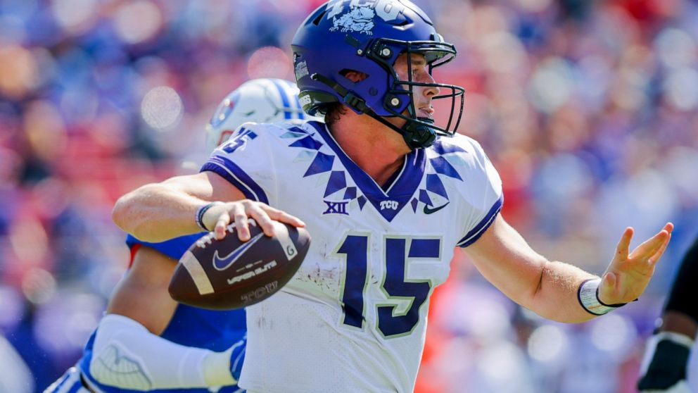 TCU quarterback Max Duggan (15) looks to pass during the first half of an NCAA college game against SMU on Saturday, Sept. 24, 2022, in Dallas, Texas. (AP Photo/Gareth Patterson)
