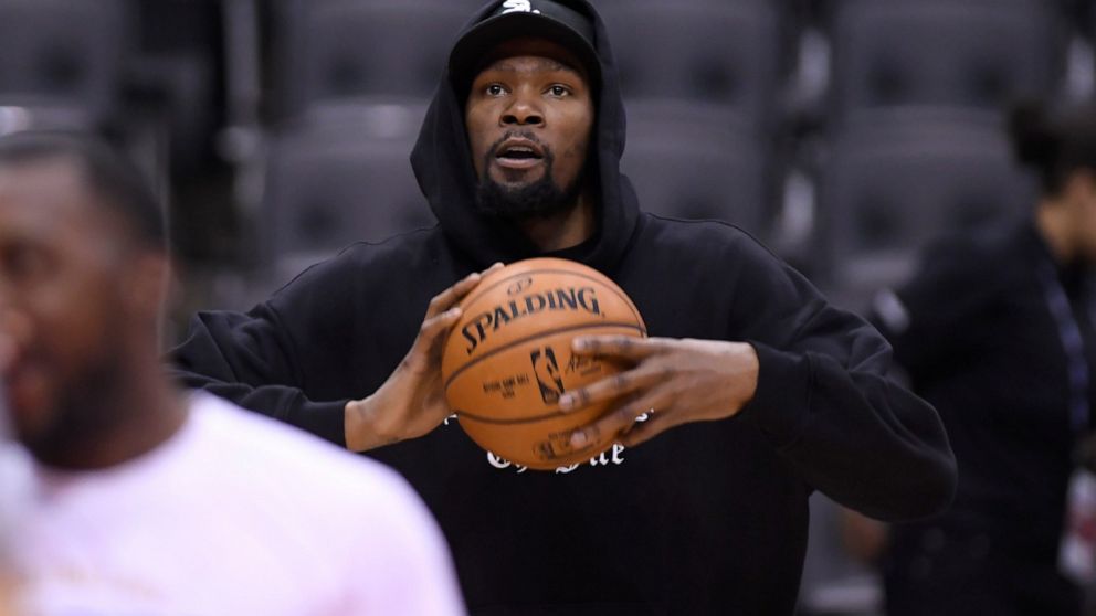 Golden State Warriors Kevin Durant watches during basketball practice at the NBA Finals in Toronto, Saturday, June 1, 2019. (Nathan Denette/The Canadian Press via AP)