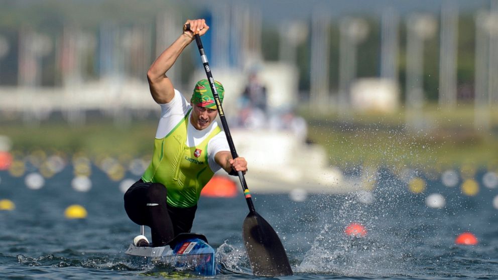 FILE - In this Saturday, Aug. 11, 2012 file photo, Lithuania's Jevgenij Shuklin competes in the men's canoe single 200-meter final at the 2012 Summer Olympics, in Eton Dorney, near Windsor, England. Olympic silver medalist Jevgenij Shuklin has been d