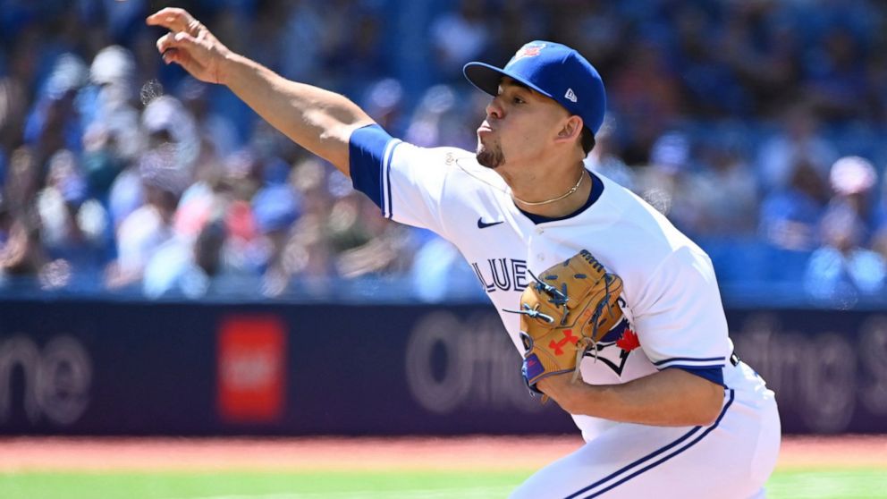 Toronto Blue Jays starting pitcher Jose Berrios throws to a Minnesota Twins batter in the first inning of a baseball game in Toronto, Saturday, June 4, 2022. (Jon Blacker/The Canadian Press via AP)