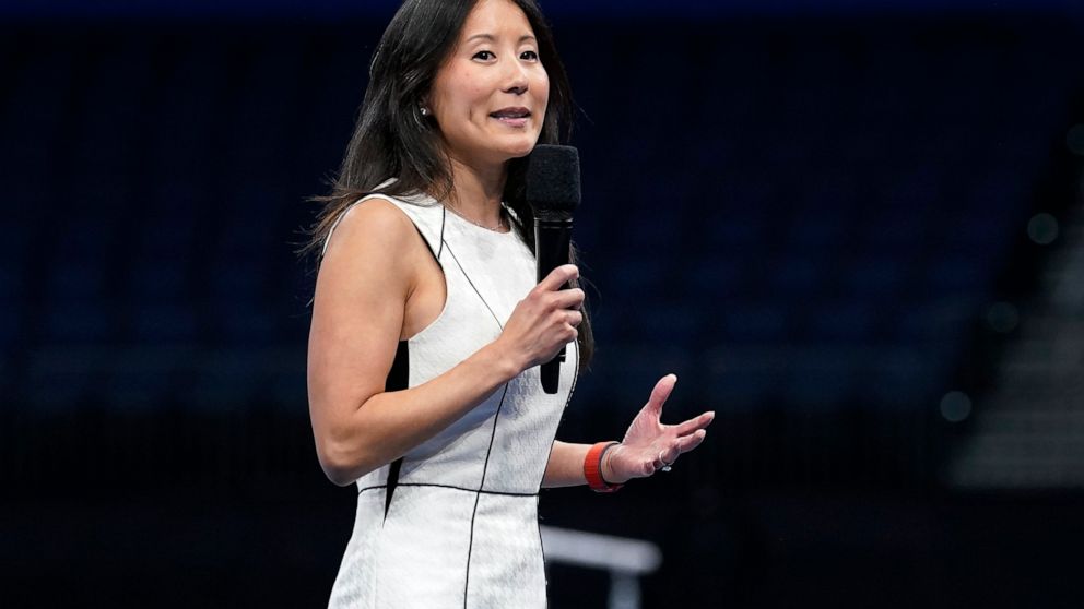 Li Li Leung, President and CEO of USA Gymnastics, speaks to the fans during the 2022 U.S. Gymnastics Championships Thursday, Aug. 18, 2022, in Tampa, Fla. (AP Photo/Chris O'Meara)