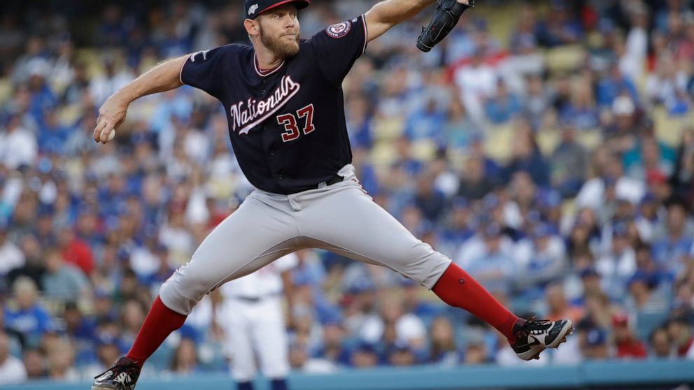 FILE - In this Oct. 9, 2019, file photo, Washington Nationals starting pitcher Stephen Strasburg throws to a Los Angeles Dodgers batter during the first inning in Game 5 of a baseball National League Division Series, in Los Angeles. World Series MVP 