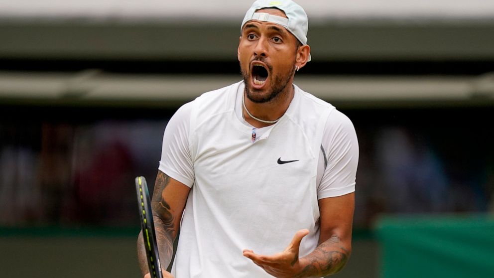 Australia's Nick Kyrgios reacts during a men's singles quarterfinal match against Chile's Cristian Garin on day ten of the Wimbledon tennis championships in London, Wednesday, July 6, 2022. (AP Photo/Alberto Pezzali)