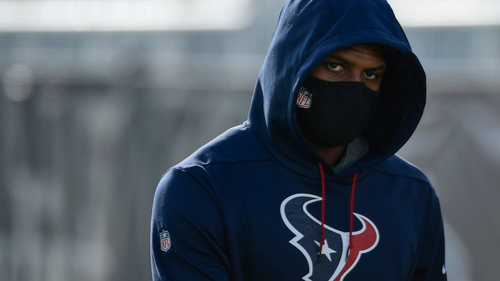 FILE - Texans quarterback Deshaun Watson arrives at NFL football practice Saturday, July 31, 2021, in Houston. The NFL suspended Watson for six games on Monday, Aug. 1, 2022 for violating its personal conduct policy following accusations of sexual mi
