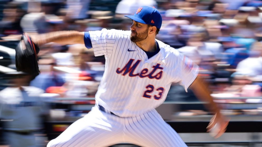 New York Mets starting pitcher David Peterson (23) throws against the Miami Marlins during the fourth inning of a baseball game, Monday, June 20, 2022, in New York. (AP Photo/Jessie Alcheh)