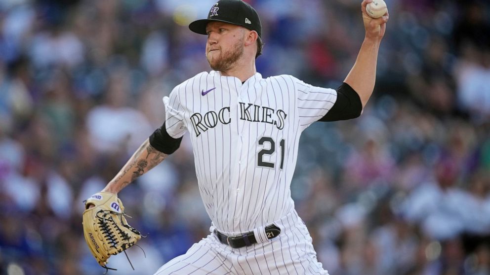 Colorado Rockies starting pitcher Kyle Freeland works against the Los Angeles Dodgers during the first inning of a baseball game Saturday, July 30, 2022, in Denver. (AP Photo/David Zalubowski)