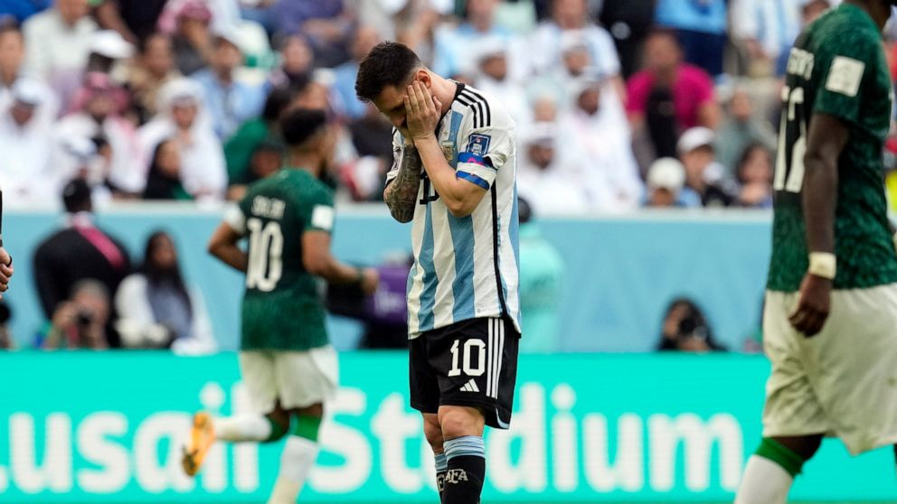 Argentina's Lionel Messi reacts disappointed during the World Cup group C soccer match between Argentina and Saudi Arabia at the Lusail Stadium in Lusail, Qatar, Tuesday, Nov. 22, 2022. (AP Photo/Natacha Pisarenko)