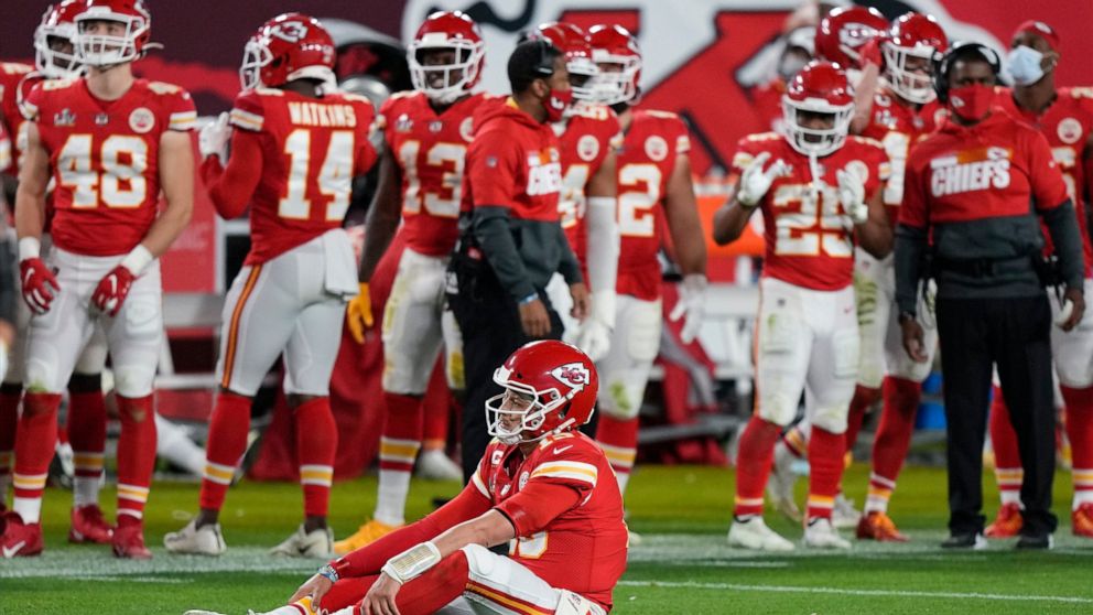 Kansas City Chiefs quarterback Patrick Mahomes (15) sits on the turf during the second half of the NFL Super Bowl 55 football game against the Tampa Bay Buccaneers, Sunday, Feb. 7, 2021, in Tampa, Fla. (AP Photo/David J. Phillip)