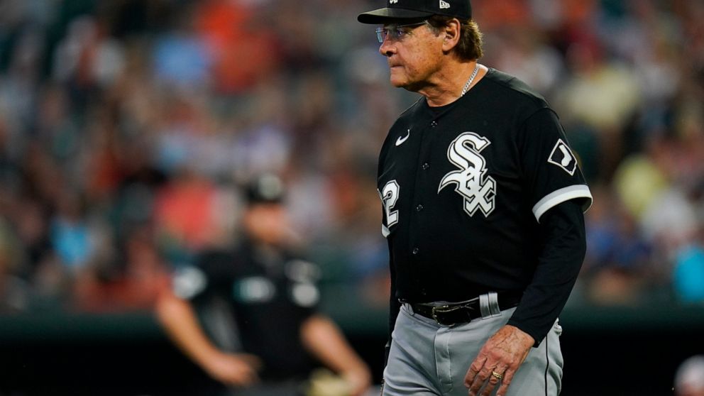 Chicago White Sox manager Tony La Russa walks on the field during the second inning of a baseball game against the Baltimore Orioles, Thursday, Aug. 25, 2022, in Baltimore. (AP Photo/Julio Cortez)