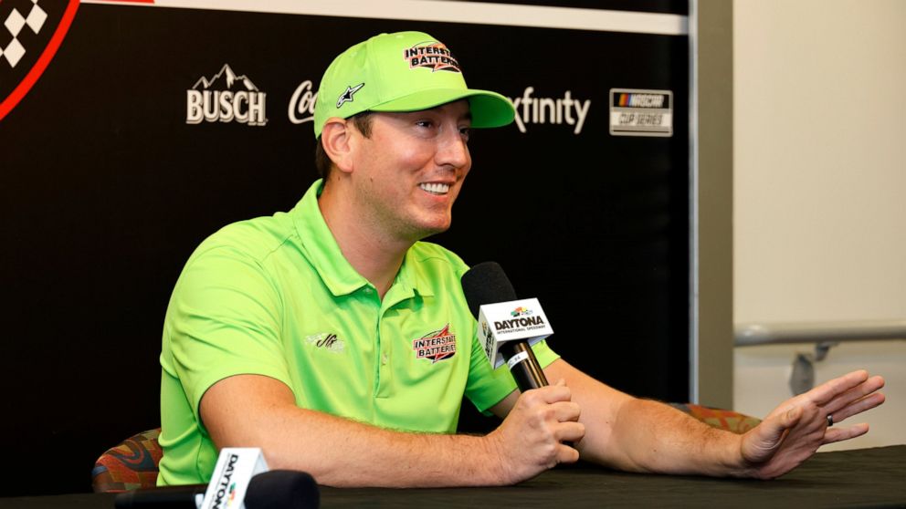 Kyle Busch answers a question from a reporter during a media availability before a NASCAR Cup Series auto race at Daytona International Speedway, Saturday, Aug. 27, 2022, in Daytona Beach, Fla. (AP Photo/Terry Renna)