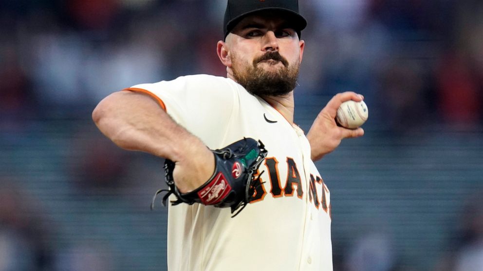 FILE - San Francisco Giants' Carlos Rodón pitches against the Colorado Rockies during the first inning of a baseball game in San Francisco, on Sept. 29, 2022. The New York Yankees added Rodón to their rotation on Thursday, Dec. 15, 2022, agreeing to 