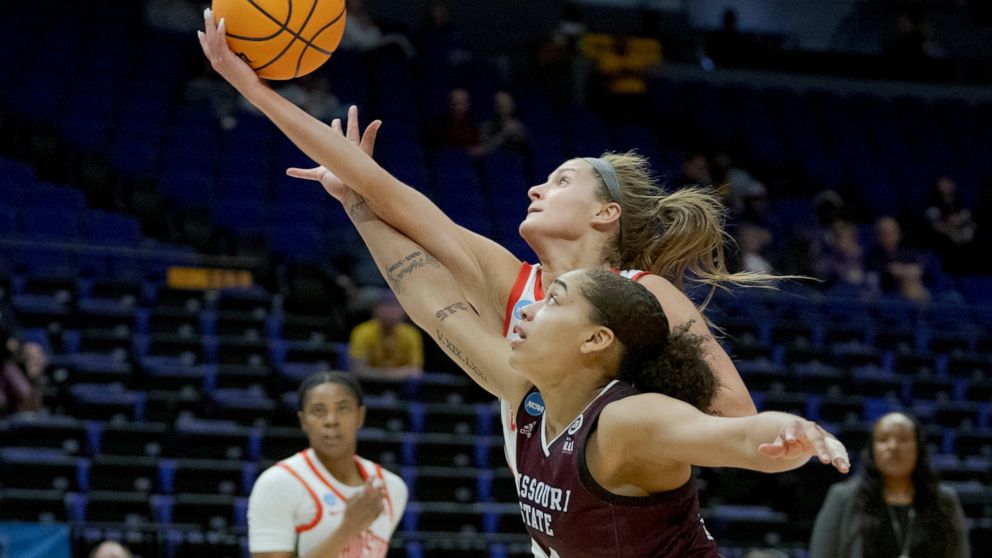 Ohio State guard Jacy Sheldon (4) fouls Missouri State guard Mariah White (14) while going for a rebound in the first half of a women's college basketball game in the first round of the NCAA tournament, Saturday, March 19, 2022, in Baton Rouge, La. (
