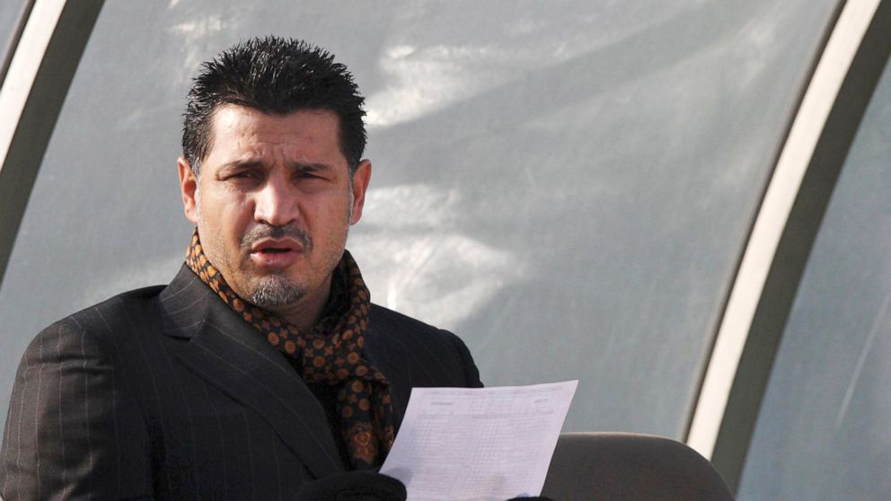 FILE - Former Iran's national soccer team coach Ali Daei before an Asian Cup 2011 qualifying soccer match between Iran and Singapore in Tehran, Iran, Jan, 14, 2009. Daei has expressed support for anti-government protests, saying that his wife and dau