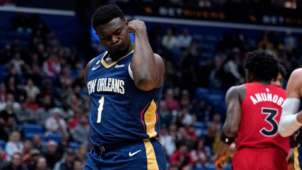 New Orleans Pelicans forward Zion Williamson (1) flexes his bicep after scoring a basket in the first half of an NBA basketball game against the Toronto Raptors in New Orleans, Wednesday, Nov. 30, 2022. (AP Photo/Gerald Herbert)