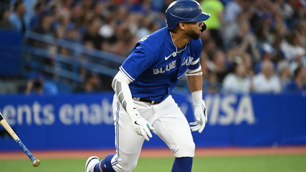 Toronto Blue Jays' Lourdes Gurriel Jr. runs on a double against the Baltimore Orioles during the third inning of a baseball game Tuesday, Aug. 16, 2022, in Toronto. (Jon Blacker/The Canadian Press via AP)