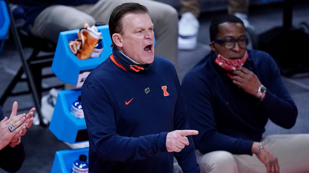 Illinois head coach Brad Underwood directs his players during the second half of a college basketball game against Loyola in the second round of the NCAA tournament at Bankers Life Fieldhouse in Indianapolis Sunday, March 21, 2021. (AP Photo/Mark Hum