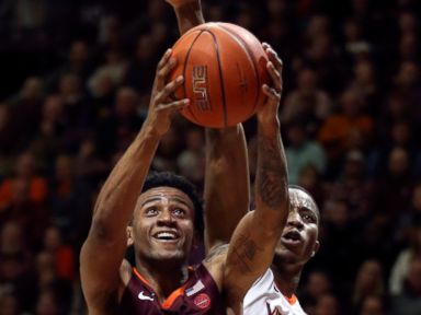 Guy's 23 lift No. 3 Virginia past No. 20 Hokies, 64-58