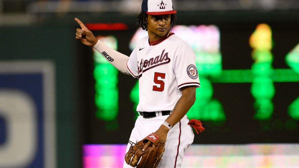 Washington Nationals shortstop CJ Abrams gestures during the fourth inning of the team's baseball game against the Chicago Cubs, Monday, Aug. 15, 2022, in Washington. (AP Photo/Nick Wass)