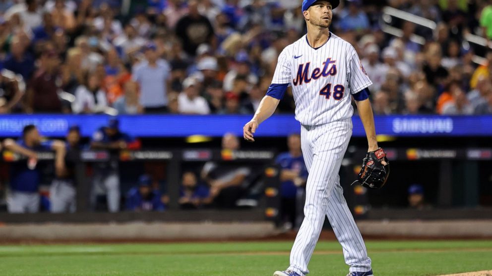 New York Mets starting pitcher Jacob deGrom reacts during the third inning of the team's baseball game against the Chicago Cubs on Tuesday, Sept. 13, 2022, in New York. (AP Photo/Jessie Alcheh)