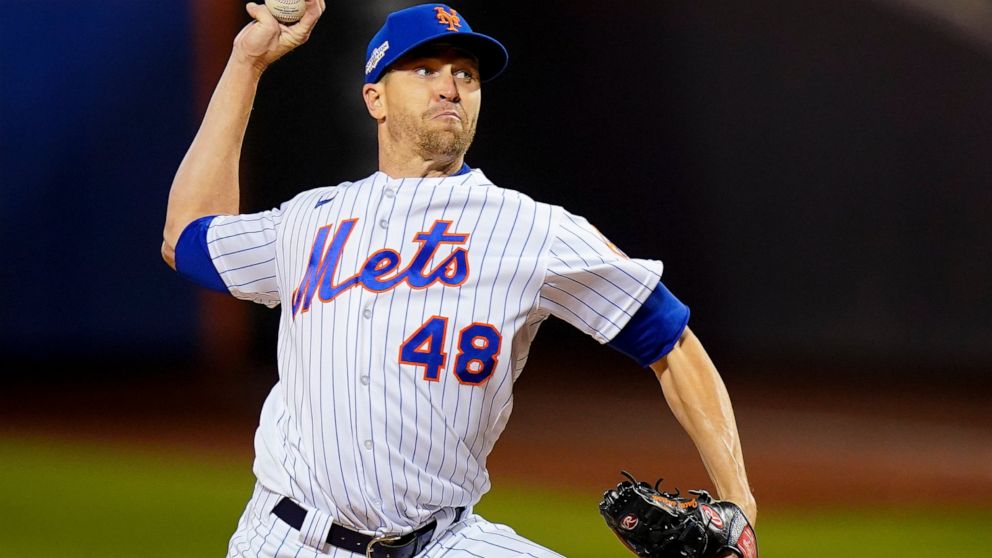 New York Mets starting pitcher Jacob deGrom (48) delivers against the San Diego Padres during the first inning of Game 2 of a National League wild-card baseball playoff series, Saturday, Oct. 8, 2022, in New York. (AP Photo/Frank Franklin II)