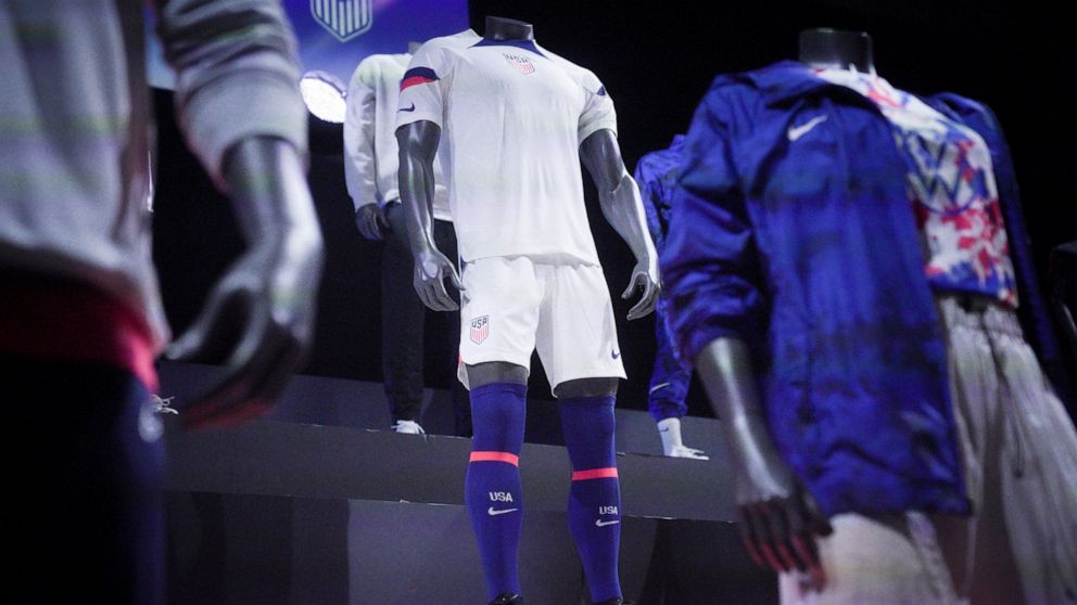 A new uniform, center, for the U.S. men's World Cup soccer team is displayed by Nike, Wednesday, Aug. 31, 2022, in New York. (AP Photo/Bebeto Matthews)