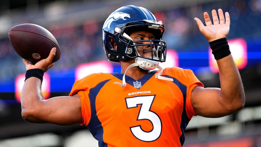 Denver Broncos quarterback Russell Wilson (3) warms up prior to an NFL preseason football game against the Minnesota Vikings, Saturday, Aug. 27, 2022, in Denver. (AP Photo/Jack Dempsey)