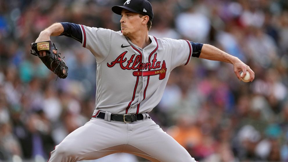 Atlanta Braves starting pitcher Max Fried works against the Colorado Rockies during the first inning of a baseball game Friday, June 3, 2022, in Denver. (AP Photo/David Zalubowski)