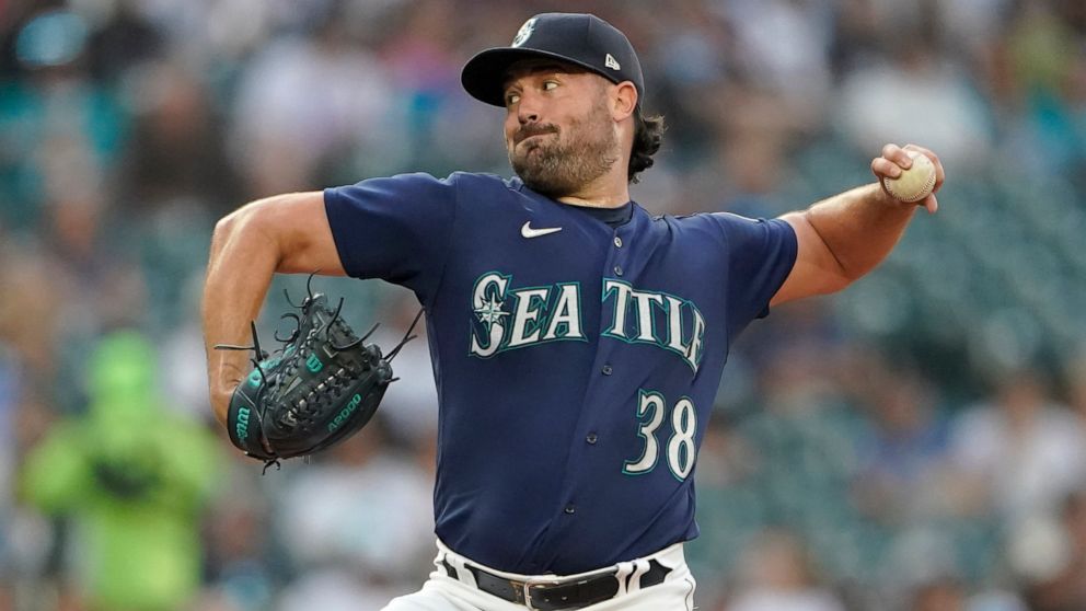 Seattle Mariners starting pitcher Robbie Ray throws against the Washington Nationals during the first inning of a baseball game, Tuesday, Aug. 23, 2022 in Seattle. (AP Photo/Ted S. Warren)