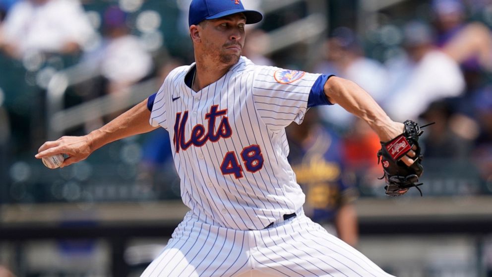 FILE - New York Mets' Jacob deGrom delivers a pitch during the first inning of the first baseball game of a doubleheader against the Milwaukee Brewers Wednesday, July 7, 2021, in New York. New York Mets ace Jacob deGrom is finally ready to begin a mi