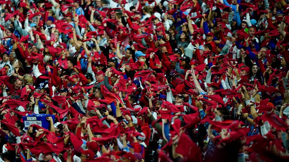 Fans cheer before Game 3 of baseball's World Series between the Houston Astros and the Philadelphia Phillies on Tuesday, Nov. 1, 2022, in Philadelphia. (AP Photo/Chris Szagola)