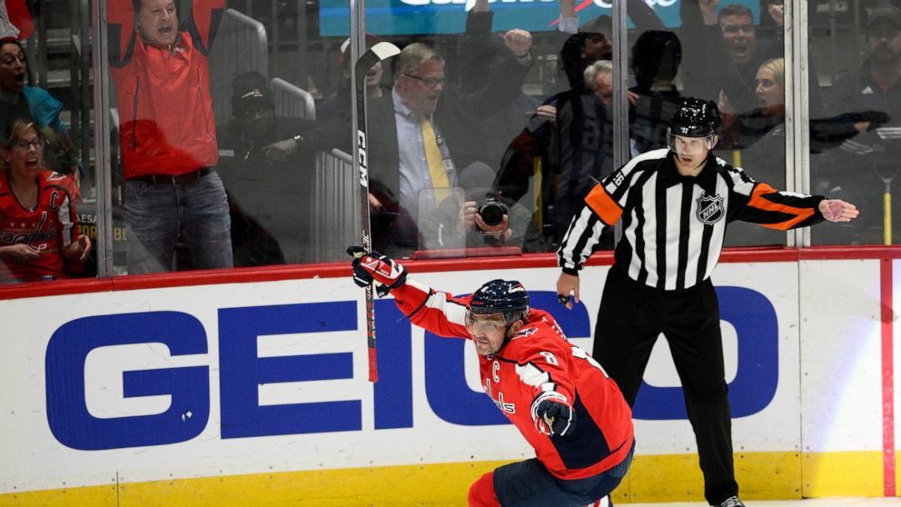 Washington Capitals left wing Alex Ovechkin celebrates his goal in overtime of an NHL hockey game against the Philadelphia Flyers, Wednesday, Nov. 23, 2022, in Washington. The Capitals won 3-2 in overtime. (AP Photo/Nick Wass)