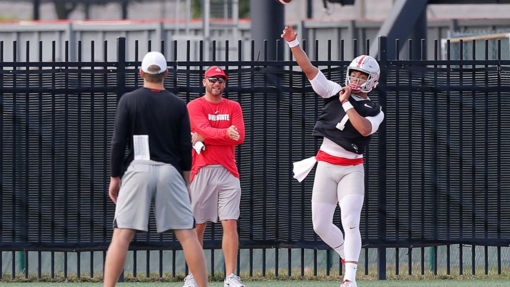 Ohio State quarterback Justin Fields throws a pass during NCAA college football practice, Friday, Aug. 2, 2019, in Columbus, Ohio. (AP Photo/Jay LaPrete)