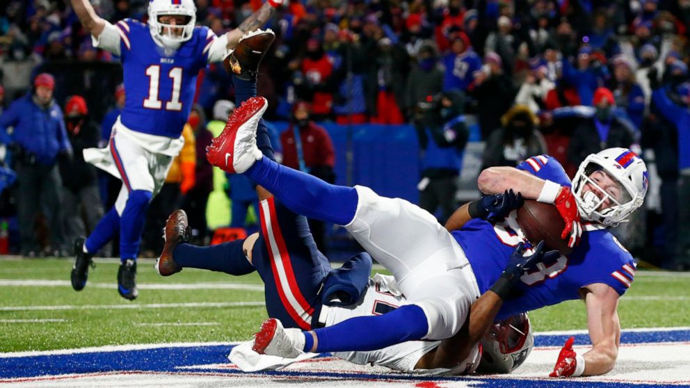 FILE - Buffalo Bills tight end Dawson Knox (88) makes a catch for a touchdown during the first half of an NFL wild-card playoff football game against the New England Patriots in Orchard Park, N.Y., Saturday, Jan. 15, 2022. The Bills signed tight end 