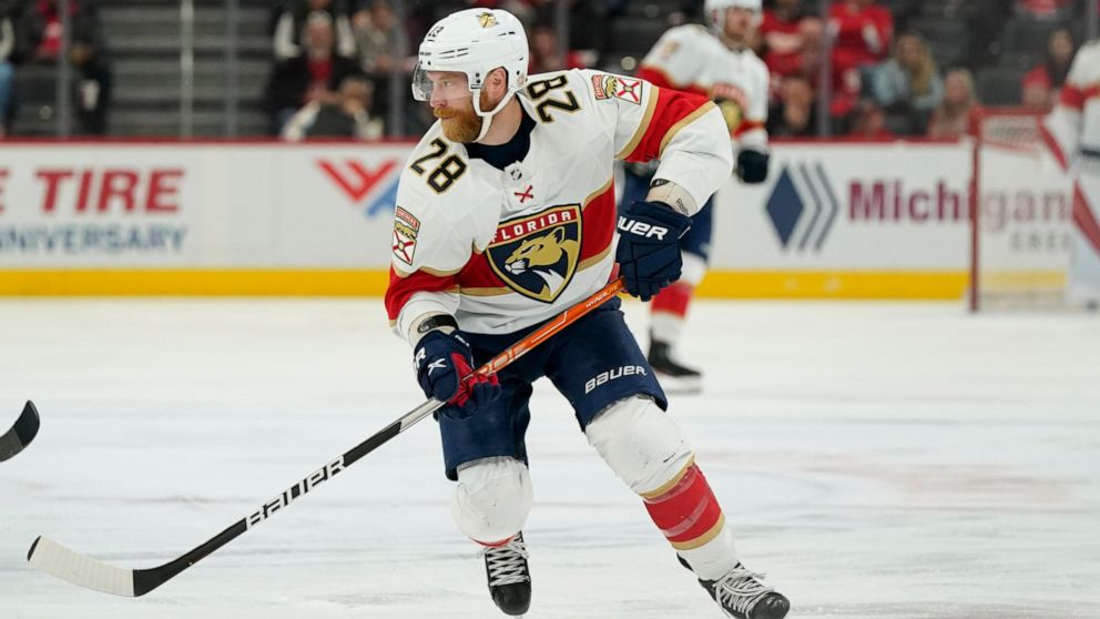 FILE - Florida Panthers right wing Claude Giroux controls the puck during the third period of an NHL hockey game against the Detroit Red Wings, Sunday, April 17, 2022, in Detroit. Giroux has signed a $19.5 million, three-year contract with the Ottawa
