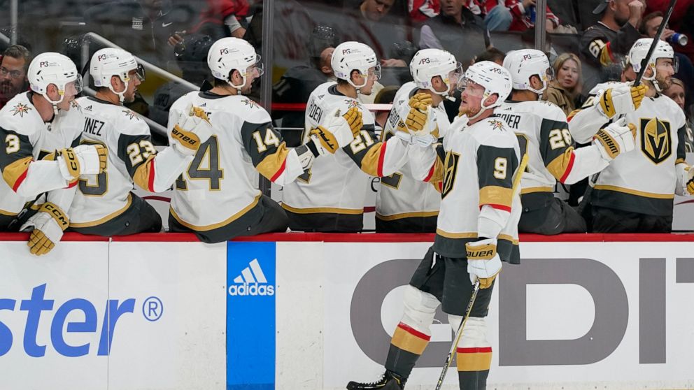Vegas Golden Knights center Jack Eichel (9) celebrates his goal with teammates in the first period of an NHL hockey game against the Washington Capitals, Tuesday, Nov. 1, 2022, in Washington. (AP Photo/Patrick Semansky)