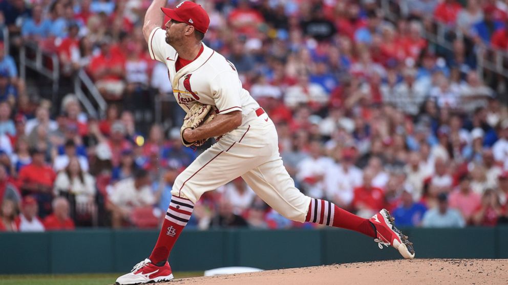 St. Louis Cardinals starting pitcher Adam Wainwright throws during the first inning of a baseball game against the Chicago Cubs, Saturday, Sept. 3, 2022, in St. Louis. (AP Photo/Joe Puetz)