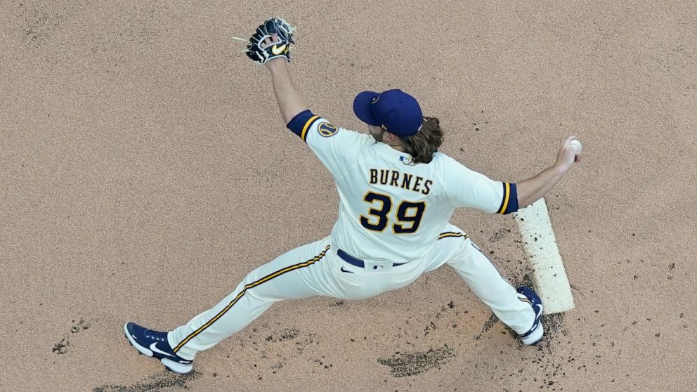 Milwaukee Brewers starting pitcher Corbin Burnes throws during the first inning of a baseball game against the St. Louis Cardinals Monday, June 20, 2022, in Milwaukee. (AP Photo/Morry Gash)