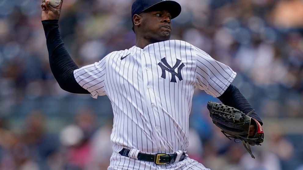 New York Yankees starting pitcher Luis Severino (40) throws in the first inning of a baseball game against the Detroit Tigers, Saturday, June 4, 2022, in New York. (AP Photo/John Minchillo)