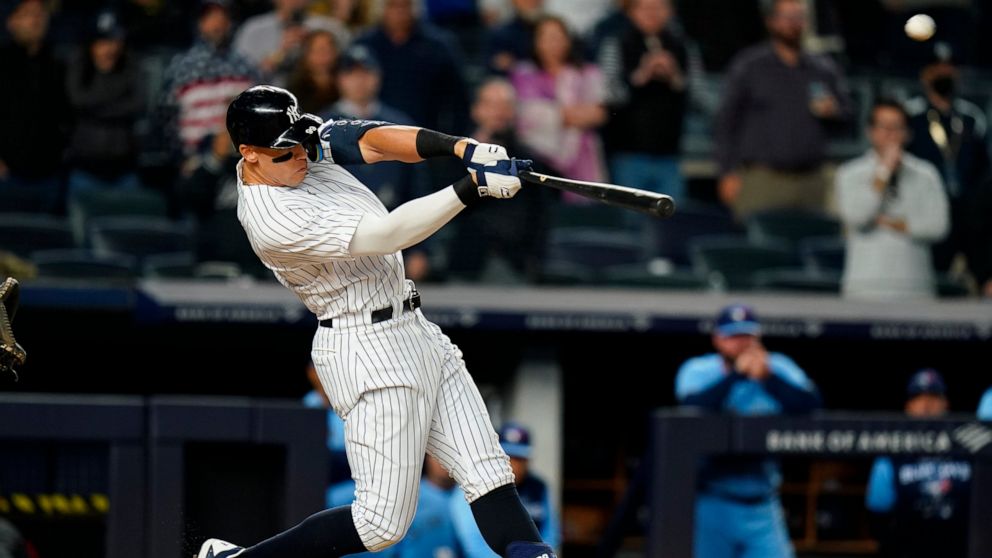 New York Yankees' Aaron Judge hits a three-run home run during the ninth inning of a baseball game against the Toronto Blue Jays Tuesday, May 10, 2022, in New York. The Yankees won 6-5. (AP Photo/Frank Franklin II)