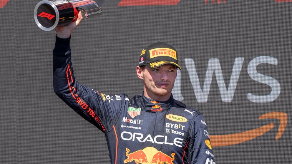 Red Bull Racing's Max Verstappen, of the Netherlands, celebrates after winning the Canadian Grand Prix auto race Sunday, June 19, 2022, in Montreal. (Paul Chiasson/The Canadian Press via AP)
