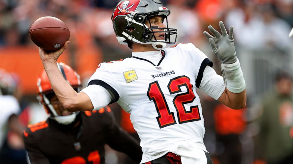 Tampa Bay Buccaneers quarterback Tom Brady (12) throws a pass during the second half of an NFL football game against the Cleveland Browns in Cleveland, Sunday, Nov. 27, 2022. (AP Photo/Ron Schwane)