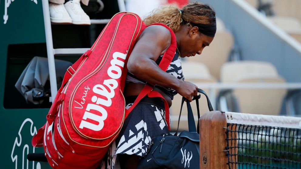 Serena Williams of the U.S. leaves after losing her third round match of the French Open tennis tournament against Sofia Kenin of the U.S. in two sets, 2-6, 5-7, at the Roland Garros stadium in Paris, Saturday, June 1, 2019. (AP Photo/Christophe Ena )