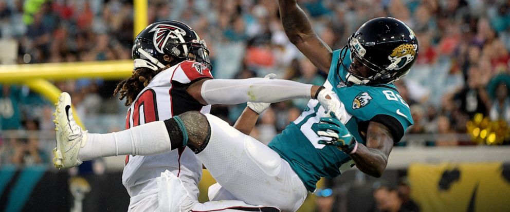 Atlanta Falcons defensive back Ryan Neal, left, breaks up a pass intended for Jacksonville Jaguars wide receiver Tre McBride, right, during the first half of an NFL preseason football game Thursday, Aug. 29, 2019, in Jacksonville, Fla. (AP Photo/Phel