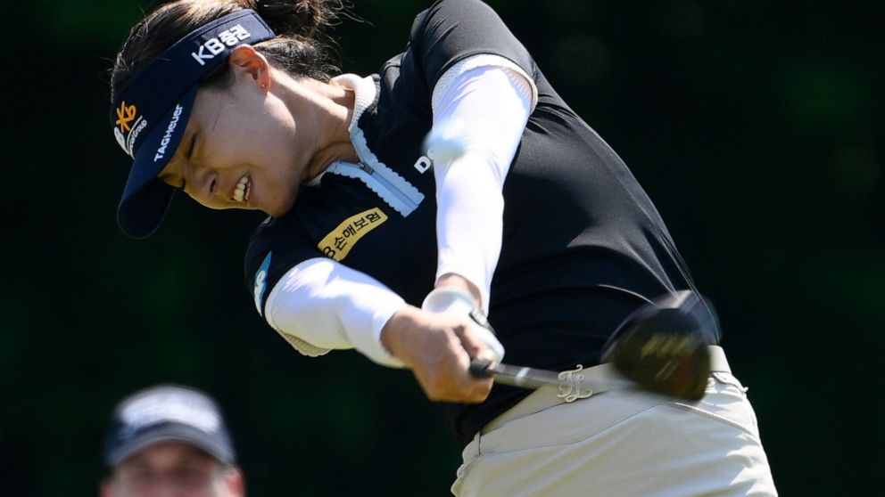 In Gee Chun, of South Korea, hits her tee shot on the 18th hole during the final round of play in the KPMG Women's PGA Championship golf tournament at Congressional Country Club, Sunday, June 26, 2022, in Bethesda, Md. (AP Photo/Nick Wass)