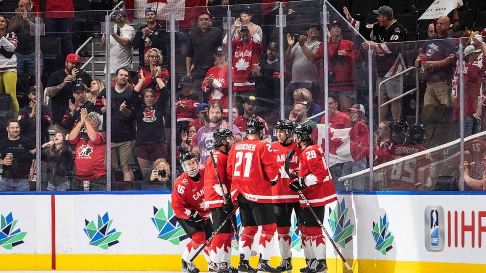 Canada celebrates a goal against Czechia during first-period IIHF world junior hockey championship semifinal action in Edmonton, Alberta, Friday, Aug. 19, 2022. (Jason Franson/The Canadian Press via AP)