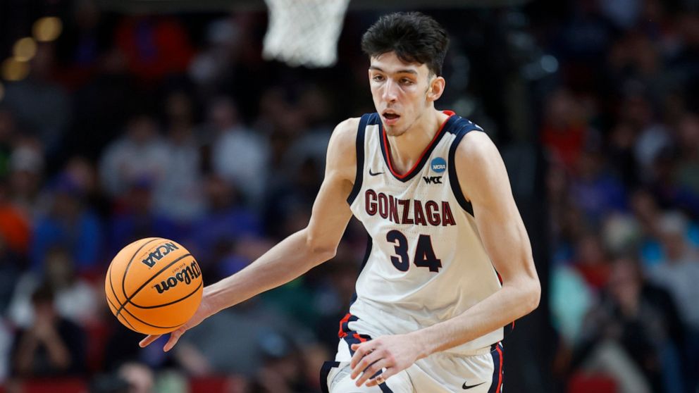 FILE - Gonzaga center Chet Holmgren (34) moves the ball against Georgia State during the second half of a first round NCAA college basketball tournament game, Thursday, March 17, 2022, in Portland, Ore. Houston, Detroit and Orlando share the best odd