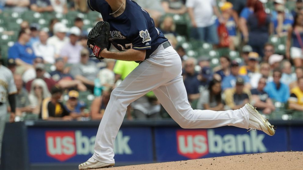 Milwaukee Brewers starting pitcher Zach Davies throws during the first inning of a baseball game against the Pittsburgh Pirates Saturday, June 8, 2019, in Milwaukee. (AP Photo/Morry Gash)