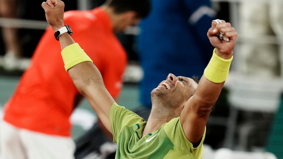 Spain's Rafael Nadal reacts after defeating Serbia's Novak Djokovic in their quarterfinal match of the French Open tennis tournament at the Roland Garros stadium Tuesday, May 31, 2022 in Paris. Nadal won 6-2, 4-6, 6-2, 7-6. (AP Photo/Thibault Camus)