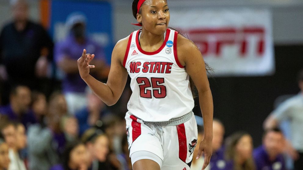North Carolina State's Kayla Jones (25) reacts after a 3-point basket during the first half of a college basketball game against Kansas State in the second round of the NCAA tournament in Raleigh, N.C., Monday, March 21, 2022. (AP Photo/Ben McKeown)